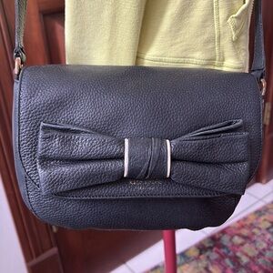 Kate Spade  Crossbody bag  small
Leather  black  bow front accent/white bow edge